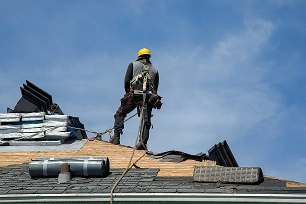 Professional Roofing technician working in Lamont, IA